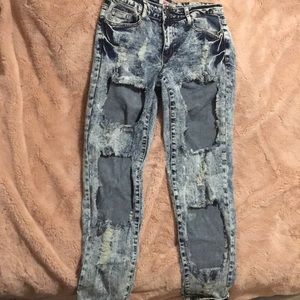 Destroyed acid wash jeans